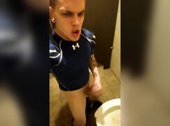 Jock Jerking In Stall Eats Cum