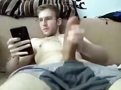 Twink With Glasses Jerks Massive Uncut Cock and Cums porn