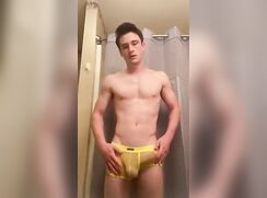 Jock Wears Yellow Mesh Underwear To Play With His Cock porn