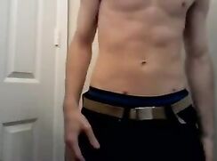 Fit boy slowly undresses