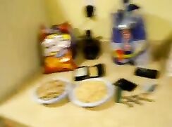 Two lads fooling around in the kitchen