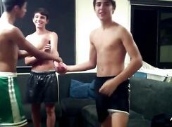 Three guys play strip and dance
