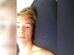 Fit blond wanking on his bed