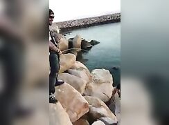 Buddy pisses on friend