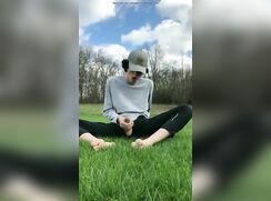 Twink risky jerks and cums in public outdoor field