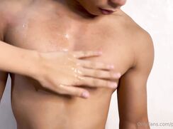 Asian Cutie Gets His Muscles Rubbed With Oil