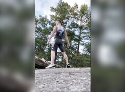 The cute fit boy in the Swedish rocks doing the welcome ritual