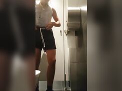 Teen with thick dick wanking in public toilet