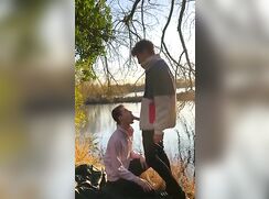 Friends having sex on riverside
