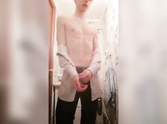 Skinny boy undresses