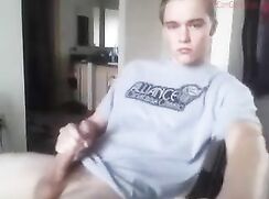 A103.Young boy in grey shirt