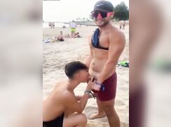 Boy sucking dick on the beach