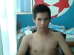 A103. Boy with earphones wank on cam