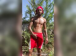 Black guy masturbates outside