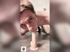 Obedient slave on dildo