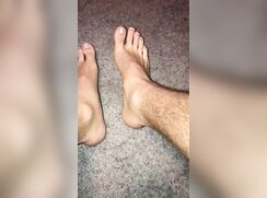 Tan hairy legs and feet