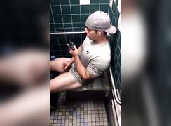 Hottie in the Next Stall Jerking Off