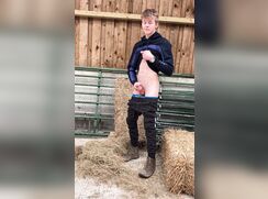 young farmer jerks off in barn