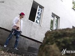 Emo boy jerks outside