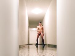 Risky naked dare in public building