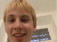A blonde haired twink wanks his cock gay teen porn