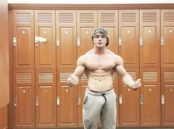 right after gym and pumped, flexing with shirt ripping