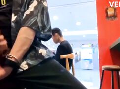 Asian jerking off and cumming on the food-court