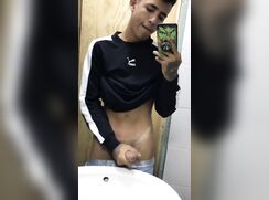 Marco jacks cock in Barrio Bathroom