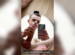 Cute blond teen Monty jerking off in front of the mirror