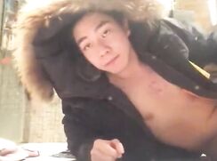 sweet Asian boy jerks in a jacket bathroom porn