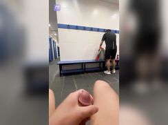 Asian adventures: a guy jerks off in the locker room of a fitness club, not shy of an