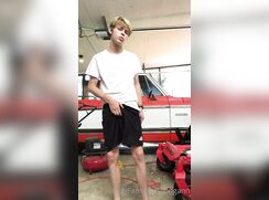 Cute blonde wanking in garage