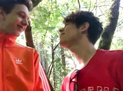 Two young Soccer Player fooling around and sucking each other in the woods