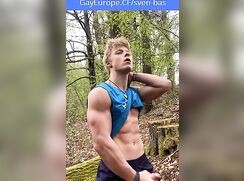 Smiling SVEN jerks off and cums in the forest to the singing of birds