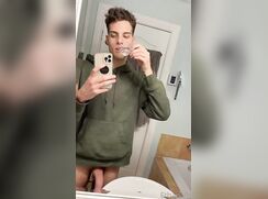 Handsome guy makes himself a protein shot