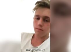 Tommy jerking off sitting on the floor and cumming without hands