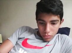 Cute boy jerking off big dick on webcam