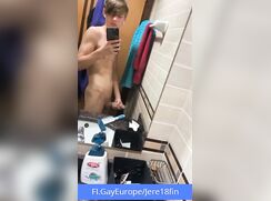 Finnish hunk jerking a big uncut cock in the bathroom