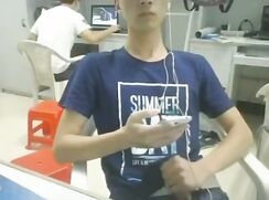 Asian Lad Cums in Public Internet Cafe