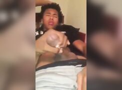 Black teen is getting a hand job