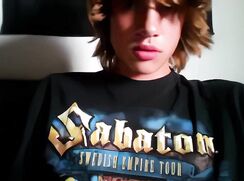 Teen with long hair jerks his big dick