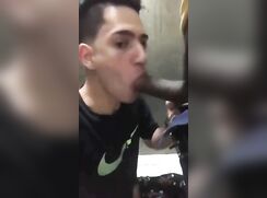 sucking black boy in public restroom