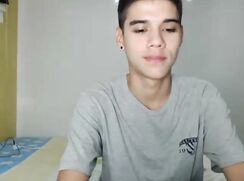 Skinny Latino boy wanks on cam show