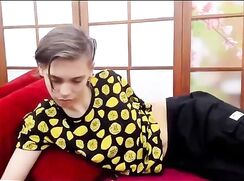 Smooth young Latino boy taking huge dildo and cumming on show