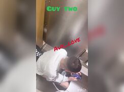 2 guys meet up in a bathroom for some understall action.