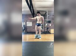 Teen body builder strikes a pose