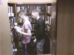 Gay couple having sex in the library porn