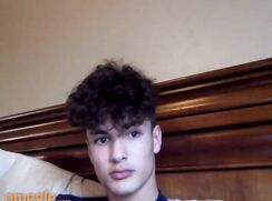 Curly boy shoots load on abs