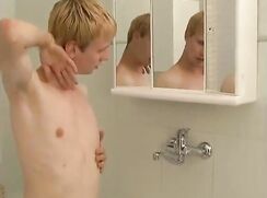 cute blond twink wanks and cums in bathroom cam