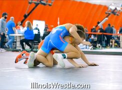 Sexy wrestling of handsome boys in tight swimsuits